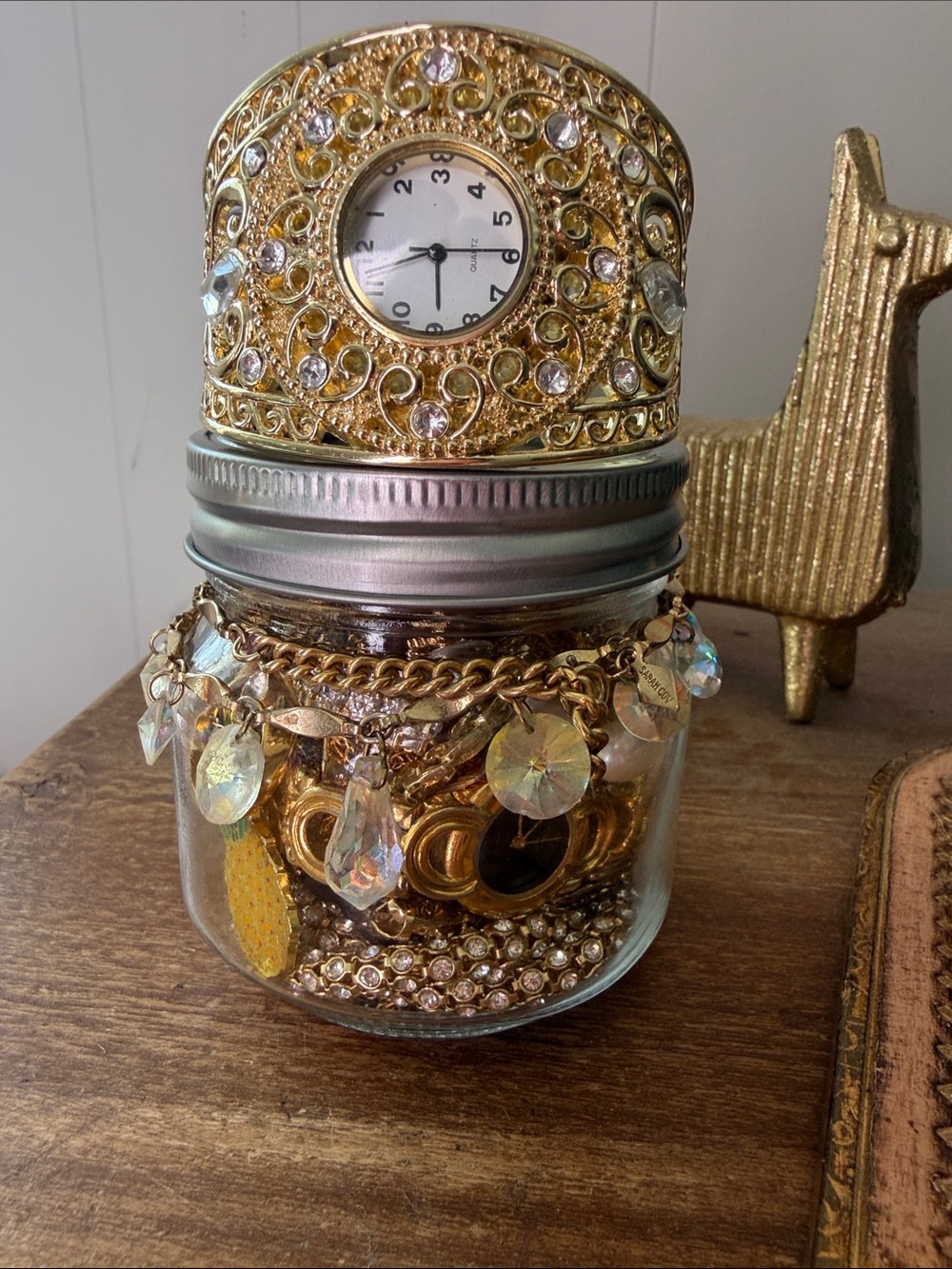 The slick golden bling is on mystery jewelry jar